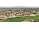 Aerial view of the property highlighting its manicured landscaping, golf course frontage, and the surrounding community at 5827 E Sanna St, Paradise Valley, AZ 85253