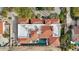 Aerial shot shows the roofline, a backyard pool, and desert landscaping at 5827 E Sanna St, Paradise Valley, AZ 85253