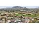 Expansive property overlooking a lush golf course with scenic mountain views at 5827 E Sanna St, Paradise Valley, AZ 85253