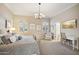 Another angle of the bedroom with a desk area, and natural light at 5827 E Sanna St, Paradise Valley, AZ 85253