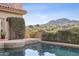 Relaxing pool with lush desert landscape and mountain views at 5827 E Sanna St, Paradise Valley, AZ 85253