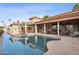 Stunning backyard pool surrounded by covered patios and comfortable seating, perfect for outdoor entertaining at 5827 E Sanna St, Paradise Valley, AZ 85253