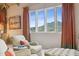 Bright sitting area with a mountain view, armchairs, and decorative table at 5827 E Sanna St, Paradise Valley, AZ 85253