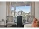 Elegant sitting area with mountain views, sculpture, and seating at 5827 E Sanna St, Paradise Valley, AZ 85253