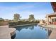 Swimming pool with a spa, stone coping, and manicured landscaping offering serene views at 5827 E Sanna St, Paradise Valley, AZ 85253