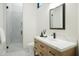 Modern bathroom boasts a walk-in shower, sleek vanity, and minimalist design at 6038 E Agave Cir, Carefree, AZ 85377