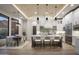 Elegant kitchen featuring a barrel brick ceiling, white cabinets, and a large center island at 6038 E Agave Cir, Carefree, AZ 85377