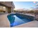 Outdoor pool and spa with beautiful desert landscape and mountain views at 6038 E Agave Cir, Carefree, AZ 85377