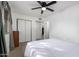 Sunlit bedroom with a ceiling fan and a view of the door and closet at 628 Leisure World --, Mesa, AZ 85206