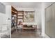 Organized garage space with shelving, workbench, and a shower at 628 Leisure World --, Mesa, AZ 85206