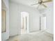 Spacious main bedroom featuring a ceiling fan, arched entryways, and ample natural light at 7557 W Colter St, Glendale, AZ 85303