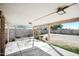 Covered patio with concrete flooring, offering a relaxing outdoor space at 7557 W Colter St, Glendale, AZ 85303