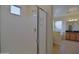 Modern bathroom with glass-enclosed shower, vanity, and bright lighting at 8776 W Peppertree Ln, Glendale, AZ 85305