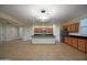 Spacious open kitchen featuring an island, tile floors, and stainless steel appliances at 8776 W Peppertree Ln, Glendale, AZ 85305