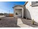 Front Entrance with a white trimmed door, tiled flooring, and large window at 9050 S Calle Tomi --, Guadalupe, AZ 85283