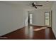 Spacious bedroom with two windows allowing natural light and features a modern ceiling fan at 9431 W Timberline Dr, Sun City, AZ 85351