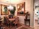 View of the dining room featuring a chandelier, decorative artwork, and seating for six at , Gilbert, AZ 85234