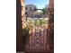 View through decorative metal gate, showing the neighborhood street at , Gilbert, AZ 85234