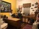 Home office with desk, credenza, sitting area, and many decorative items at , Gilbert, AZ 85234