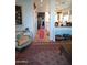 Inviting living room featuring a hallway with a red rug leading to the kitchen at , Gilbert, AZ 85234