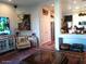 Spacious living area featuring a hallway with a red rug leading to the kitchen at , Gilbert, AZ 85234