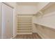 The large closet is a dream come true with built in storage solutions and a bright and airy feeling at 11258 E Ocaso Ave, Mesa, AZ 85212