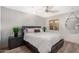 Serene bedroom featuring wood floors, a neutral color scheme, and a window with natural light at 122 E Loma Vista Dr, Tempe, AZ 85282