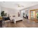 Spacious main bedroom featuring wood floors, a sitting area, ensuite bath, and ample natural light at 122 E Loma Vista Dr, Tempe, AZ 85282