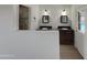 Bathroom featuring double vanities, tiled floors and a decorative shower at 1329 N 25Th St, Mesa, AZ 85213