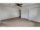 Spacious bedroom with tile floors and ample closet space for storage and personalization at 1329 N 25Th St, Mesa, AZ 85213