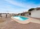 Backyard featuring a sparkling pool with a rock landscape at 1329 N 25Th St, Mesa, AZ 85213