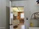 View into kitchen showcasing a cozy breakfast nook with a window at 13808 N 108Th Dr, Sun City, AZ 85351