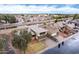 Aerial view of a well-maintained home with a canal nearby, showcasing the surrounding community at 1438 S 30Th St, Mesa, AZ 85204