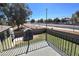 A back patio with a view of the nearby street and canal at 1438 S 30Th St, Mesa, AZ 85204