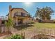 Backyard with grass, shed, patio and balcony above at 1438 S 30Th St, Mesa, AZ 85204