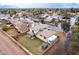 Backyard view of a home featuring a spacious yard, patio, and adjacent RV parking at 1438 S 30Th St, Mesa, AZ 85204