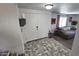 Foyer featuring neutral flooring, a double-door closet, and views of the living area at 1438 S 30Th St, Mesa, AZ 85204