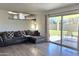 Relaxing living room with a large sliding glass door to a backyard patio space at 1438 S 30Th St, Mesa, AZ 85204