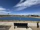 Well-maintained blue basketball court in a community park setting under a bright, clear sky at 15652 W Deanne Dr, Waddell, AZ 85355