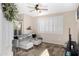 Cozy living room featuring neutral colors, comfortable gray sofa and abundant natural light at 1576 E Jasper Ct # E, Gilbert, AZ 85296