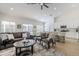 Open-concept living room with kitchen and dining area providing a spacious and connected feel at 1881 E Erie St, Chandler, AZ 85225