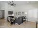 Bright living room with a ceiling fan and stylish decor for comfortable living at 1881 E Erie St, Chandler, AZ 85225