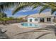 View of a backyard swimming pool and a covered patio area at 1881 E Erie St, Chandler, AZ 85225