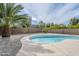 Backyard pool featuring desert landscaping and a clear blue sky at 1881 E Erie St, Chandler, AZ 85225