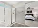 Bathroom featuring a glass shower stall, tile floor and towel rack at 19242 W Madison St, Buckeye, AZ 85326