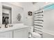 Bright bathroom with modern fixtures, stylish vanity, and a shower-tub combination at 19242 W Madison St, Buckeye, AZ 85326