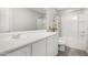 Bathroom featuring tile floors, white cabinets, and a shower/tub combo at 19242 W Madison St, Buckeye, AZ 85326