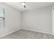 Bedroom featuring neutral paint, carpet, a ceiling fan, and a window at 19242 W Madison St, Buckeye, AZ 85326