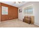 Neutral bedroom with two large windows bringing in tons of light at 20784 N Marina Ave, Maricopa, AZ 85139