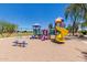 Community playground with slides and climbing structure offers many ways to enjoy recreation at 20784 N Marina Ave, Maricopa, AZ 85139